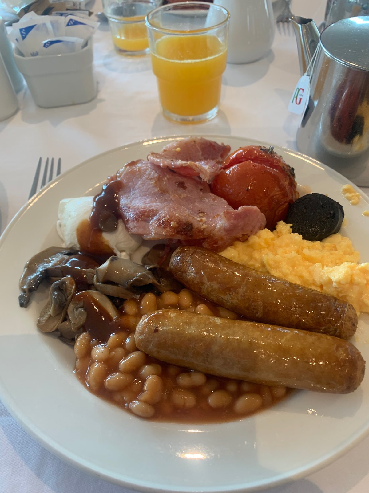A cooked breakfast with orange juice at the Arona Gran
